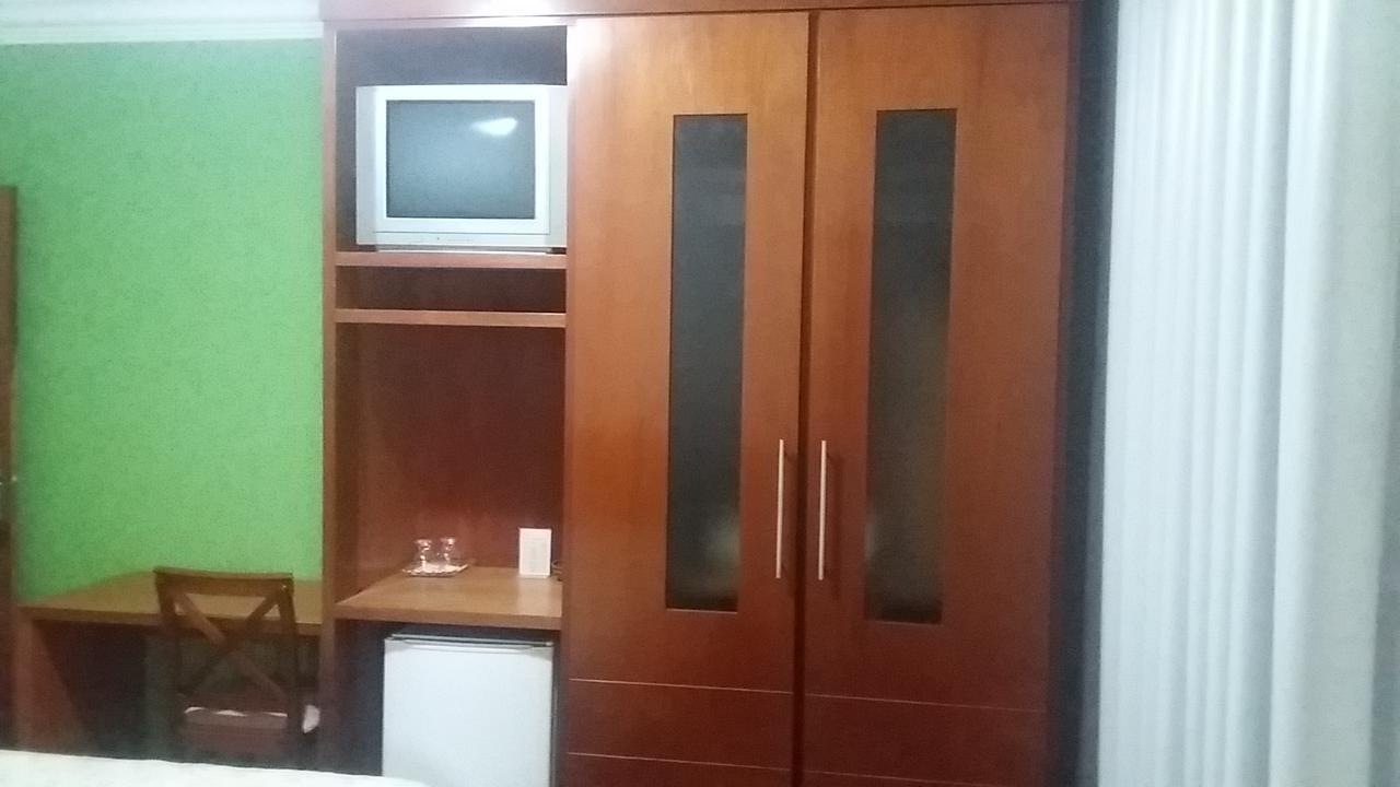 Abdon Flat Hotel Passos Buitenkant foto